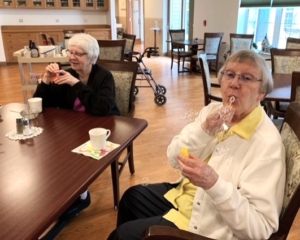 S. Judy and S. Rachel blowing