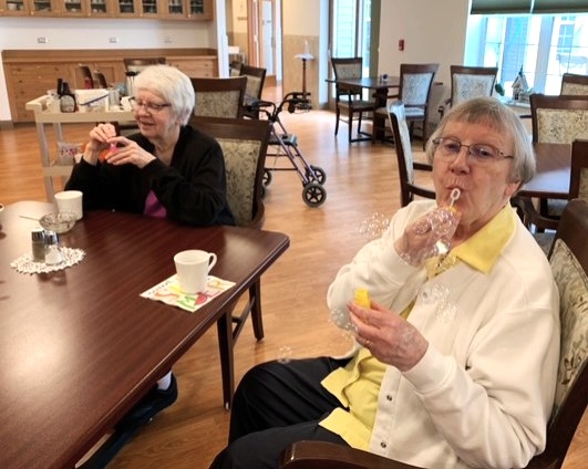 S. Judy and S. Rachel blowing S. Judy and S. Rachel blowing