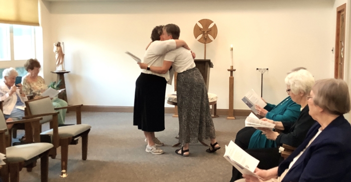 Sister Jennifer welcomes Sue into her new role. Sister Jennifer welcomes Sue into her new role.