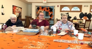 Sister Dianne, Morgan, and Sister Karen into a good game. Sister Dianne, Morgan, and Sister Karen into a good game.