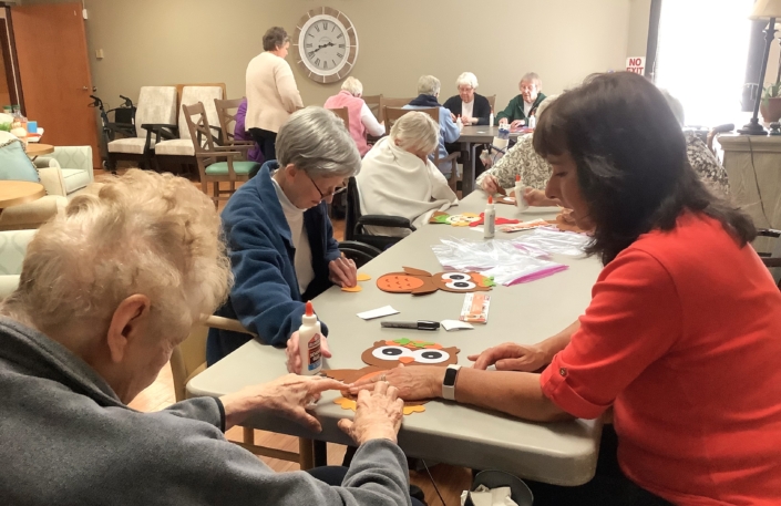 Sisters Jeannine and Eileen B. at work with Theresa.