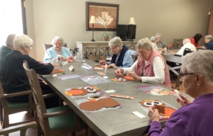 Sisters Judy, Domica, Anne, Kathleen and Eileen M. at work.